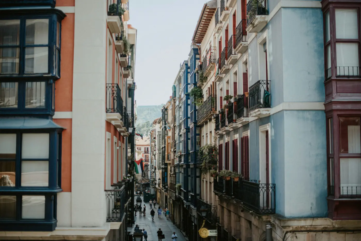 Colorful narrow streets of Bilbao's Casco Viejo Old Town with traditional Basque architecture and iron balconies