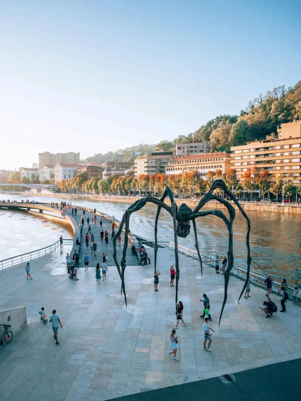 Maman spider sculpture by Louise Bourgeois beside the Guggenheim Museum Bilbao on the Nervion riverside