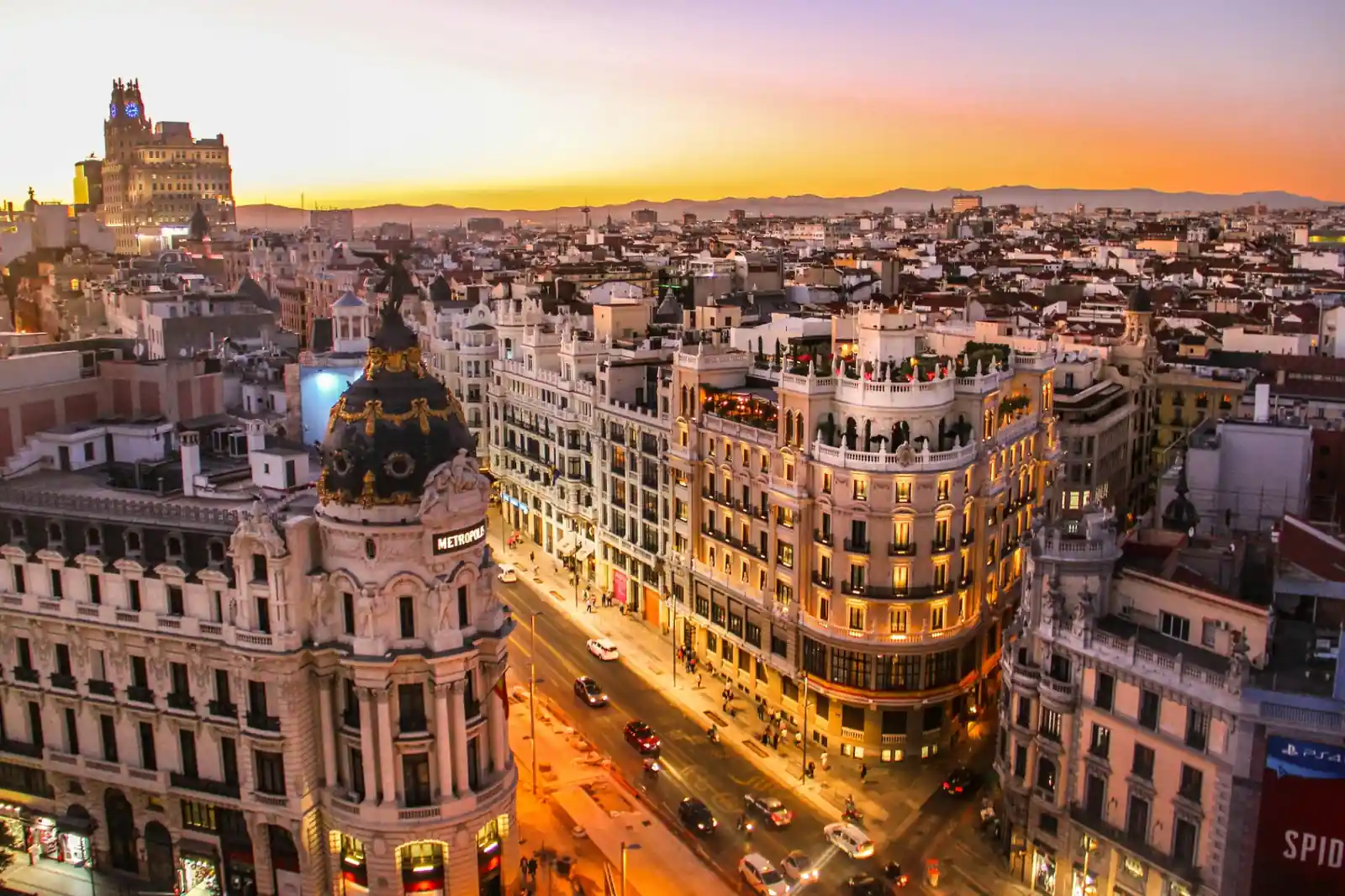 Historic center of Madrid at sunset with Gran Vía and Metropolis building