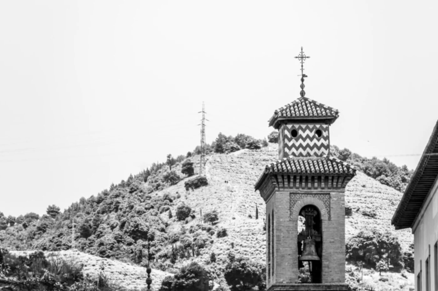 Bell tower of the Iglesia de Santa Ana in Granada, a landmark near the historic Realejo Jewish quarter