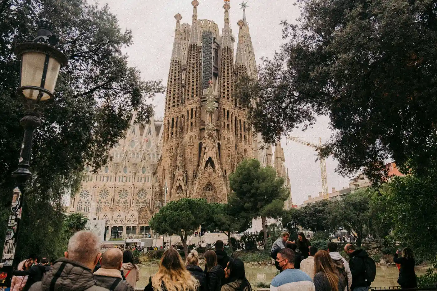 Sagrada Familia Nativity facade with intricate sculptural details in warm Mediterranean light