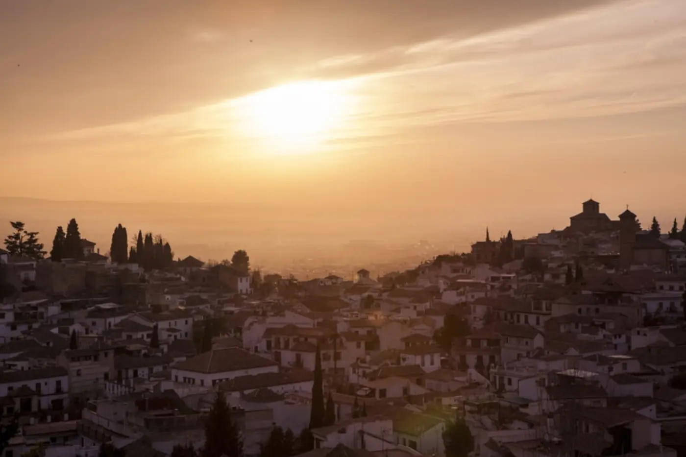 Panoramic view from San Miguel Alto viewpoint overlooking the Alhambra palace and Granada cityscape