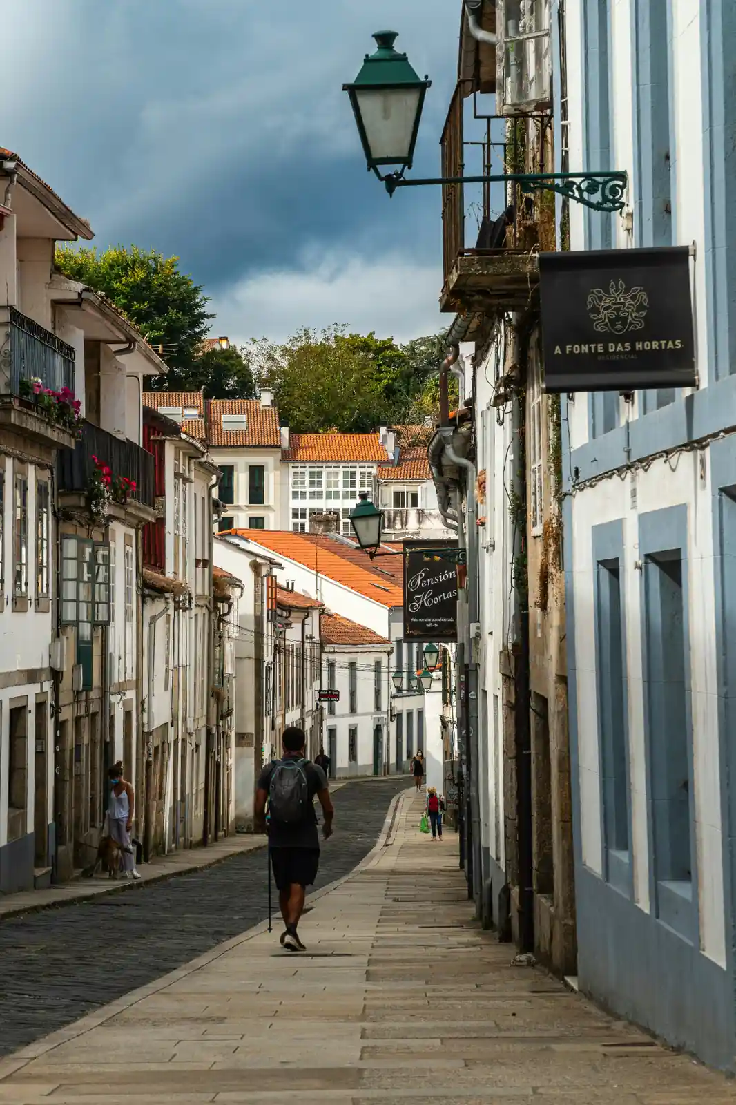 Stone arched street in the historic UNESCO old town of Santiago de Compostela