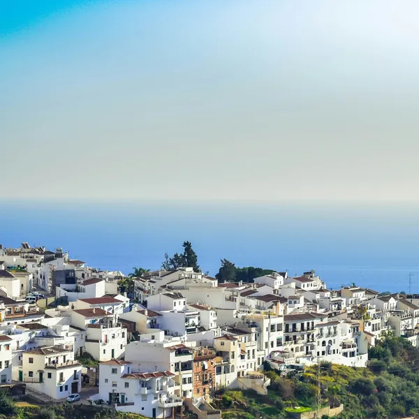 Whitewashed houses and flower-filled streets in Frigiliana